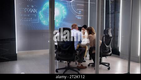 Business Team Working At Office Desk In Meeting Stock Photo