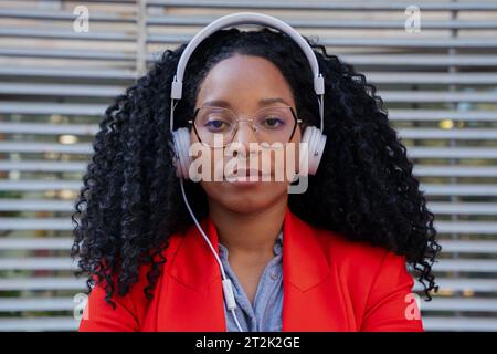 Individual close up of African American businesswoman standing in office Stock Photo