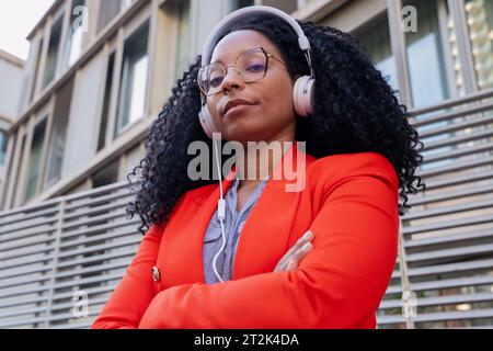 Individual close up portrait of African American businesswoman standing outdoors Stock Photo