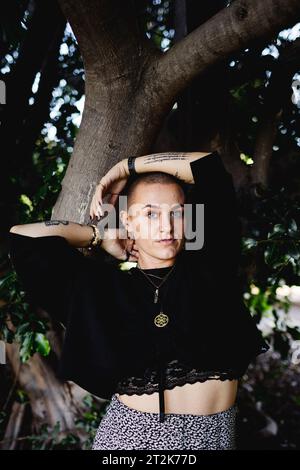 Portrait of Non Binary Person with Shaved Head in San Diego Stock Photo