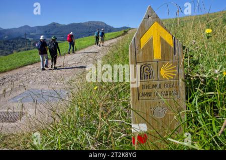 ZUMAIA, SPAIN, September 25, 2023 : Pilgrims on the way to Santiago de Compostella by Camino del Norte (North path) in Basque country. Stock Photo