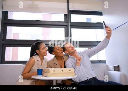 Employees take a break at office. Business and occupation concept. Stock Photo
