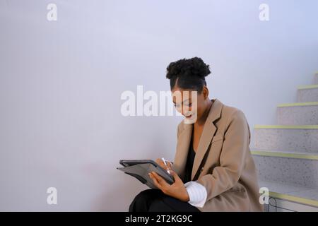 Employee use digital tablet at office. Business and occupation concept. Stock Photo