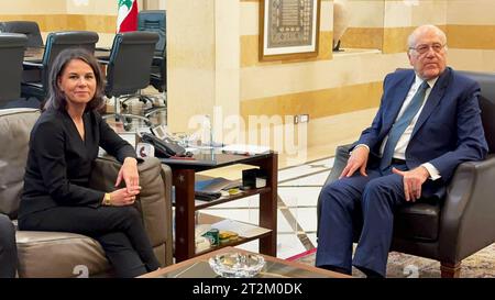 Prime Minister of Lebanon Najib Mikati and his wife May Mikati sign a
