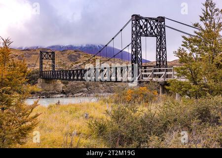 The old Puente Laguna Amarga over the Rio Paine in Torres del Paine National Park, Chile Stock Photo