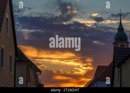 Sunset with church tower, Ringsheim, Baden-Wuerttemberg, Germany Stock Photo