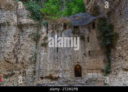 Facade of a building carved in stone, the house of the Moorish king, water mine in ronda, malaga, spain Stock Photo