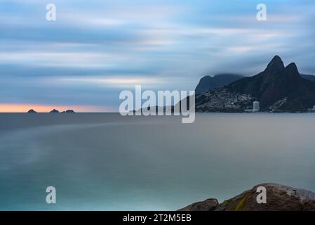 Romantic Sunset View from Arpoador Rock in Rio de Janeiro, Brazil Stock Photo