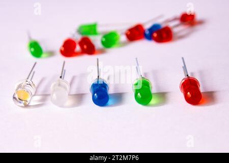 A row of Through Hole led diodes, red,blue,green and white, electronic component Stock Photo
