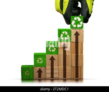 Gloved hand arranging wood blocks with green Recycling Symbols and brown arrows pointing upwards. Isolated on white background. Zero waste concept. Stock Photo