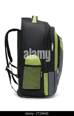rolling green backpack isolated on white background. travel daypack with zippered and shoulder straps. foldable stand bag with handle and wheels. Stock Photo
