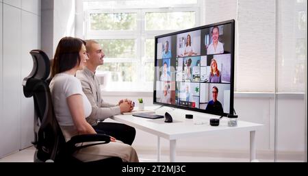 Webinar Meeting In Office Learning On Hybrid Tablet Stock Photo