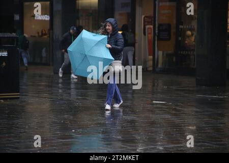 Newcastle, UK. 20th Oct 2023. Storm Babet - People battle the weather in Newcastle City Centre as second Red warning issued by the Met Office. Storm Babet has already brought significant impacts, particularly to eastern England and Scotland. Newcastle upon Tyne, UK, October 20th, 2023, Credit: DEW/Alamy Live News Stock Photo