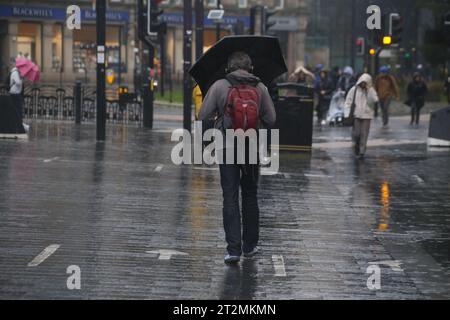 Newcastle, UK. 20th Oct 2023. Storm Babet - People battle the weather in Newcastle City Centre as second Red warning issued by the Met Office. Storm Babet has already brought significant impacts, particularly to eastern England and Scotland. Newcastle upon Tyne, UK, October 20th, 2023, Credit: DEW/Alamy Live News Stock Photo