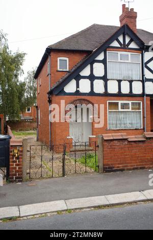 A run down semi detached 1930s house with original front door in Doncaster Stock Photo