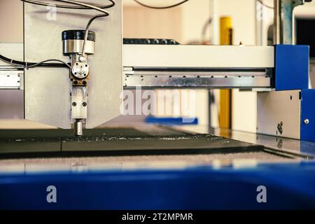 CNC water jet cutting machine modern industrial technology. Stock Photo