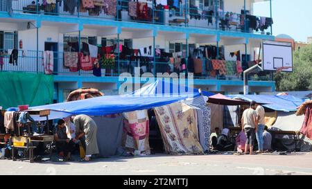 October 20, 2023: Gaza, Palestine. 20 October 2023. Tents have been set up next to an UNRWA school in Deir al Balah, to be used as shelter by displaced Palestinians during the ongoing Israeli military offensive in Gaza. The Gaza Strip has been under heavy bombardment for the 14th consecutive day, with a large number of displaced Palestinians struggling to find safety in the besieged and overcrowded tiny Palestinian enclave (Credit Image: © Adel Al Hwajre/IMAGESLIVE via ZUMA Press Wire) EDITORIAL USAGE ONLY! Not for Commercial USAGE! Stock Photo