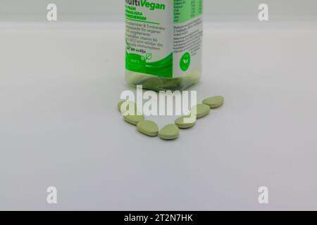 Vegan vitamin bottle isolated on white background Stock Photo
