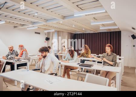 Business training. Business exam at classroom. Business people having test. Solving test questions. Business training. Multicultural Stock Photo