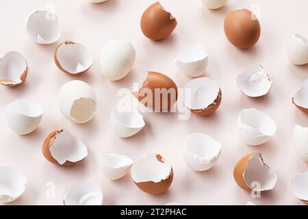 Springtime easter layout. Empty broken chicken eggshells. Stock Photo