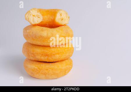 Donuts cake bakery sprinkled with sugar on white background Stock Photo