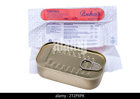 Tin of PINHAIS SARDINES IN TOMATO SAUCE and opened Wrapper with Information on Nutrients Stock Photo