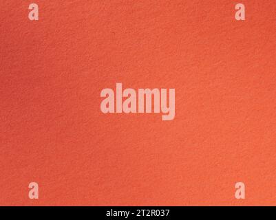 Closeup photo of sheet of red orange cardboard paper Stock Photo