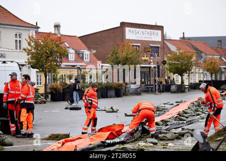 Koege, New Zealand. 21st Oct 2023. Cleaning up at the port. Destruction and flooding after the violent weather in Koege, Saturday 21 October 2023.. (Photo: Nils Meilvang/Ritzau Scanpix) Credit: Ritzau/Alamy Live News Stock Photo