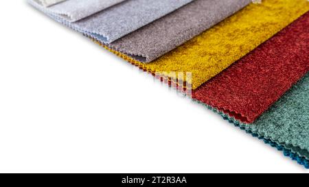 Colorful textile samples, isolated on white background. Fabric swatches, set in different colors for selection. Variety of upholstery material for fur Stock Photo