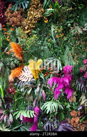 Wall of Flowers on Avenida Presidente Masaryk during  Festival de Flores (Day of the Dead)  in Polanco Neighbourhood in Mexico City, Mexico Stock Photo