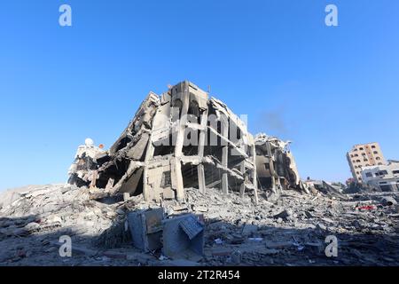 Gaza, Palestine. 20th Oct, 2023. A General view for the damages after Israeli strikes on the towers, of Al-Zahra City central Gaza Strip, amid the ongoing conflict between Israel and Palestinian Islamist group Hamas. The escalation and battles between Israel and the armed factions continue for the thirteenth day in a row. The Palestinian Ministry of Health announced today, Saturday, the killing of more than 4,137 Palestinians, and Israel released two Americans who had been detained by Hamas since October 7, after talks held by Qatar with Hamas. Credit: SOPA Images Limited/Alamy Live News Stock Photo