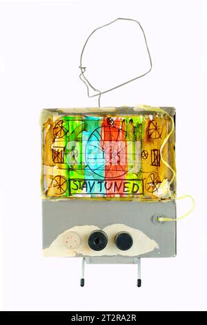 Super Grungy TV set model with test pattern and  caption "stay tuned", offline, server glitch, disturbance, website down error sign, isolated on white Stock Photo