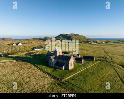 Aerial view of the island of Iona in the morning light, with the Christian Iona Abbey, pilgrimage destination, Iona Monastery Church, Hebrides Stock Photo