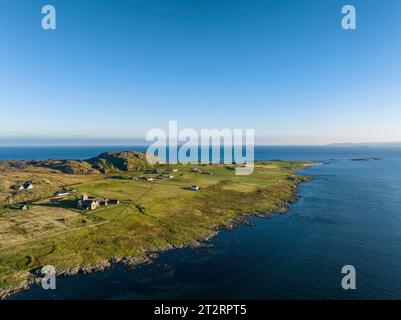 Aerial view of the island of Iona in the morning light, with the Christian Iona Abbey, pilgrimage destination, Iona Monastery Church, Hebrides Stock Photo