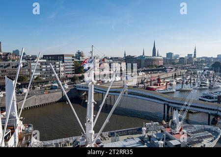 View of Niederhafen harbour and the museum ship Cap San Diego at the Ueberseebruecke bridge in the Port of Hamburg from a cruise ship Stock Photo