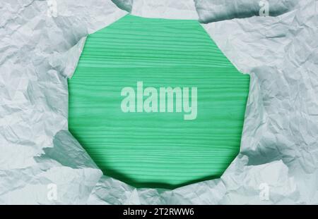 Pale Blue Frame of Ripped Paper with Pastel Mint Wooden Copy Space Stock Photo