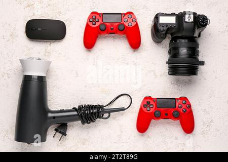 Frame made of modern gadgets on grunge background Stock Photo