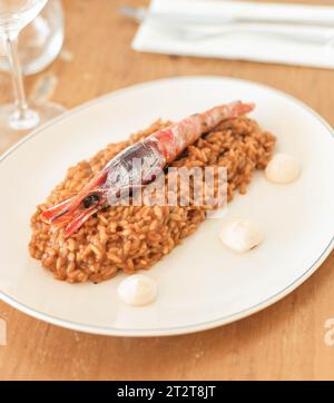 Gourmet rice dish with coastal shrimp Stock Photo