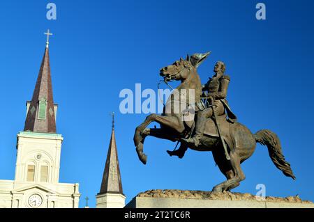 A statue sculpture of Andrew Jackson riding horseback dominates Jackson Square, near St Louis Cathedral, In the New Orleans French Quarter Stock Photo