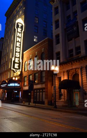 The marquee of the Tennessee Theater in Knoxville brightens the downtown business district at night Stock Photo