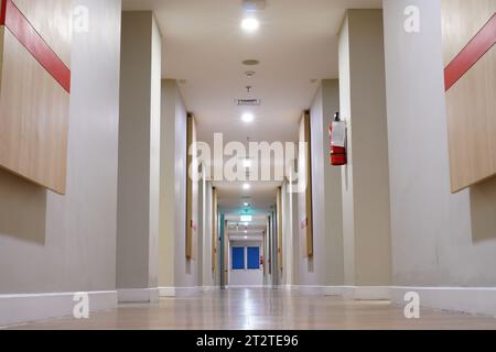 Empty and serene hotel corridor with intricate design Stock Photo