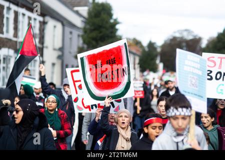 CARDIFF, WALES. 21st October 2023. Protesters march from Cardiff City Hall to the Senedd in solidarity with Gaza and Palestine due to the recent support to Israel from the UK Government. Stock Photo