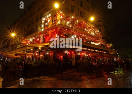 The traditional French restaurant at rainy Florida evening It located in Les Halles district of Paris. Stock Photo