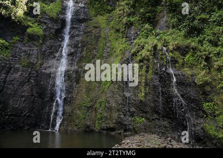 The site of the 3 Cascades of Te Fa’aurumai on the east coast of the island of Tahiti. The three waterfalls in the Faarumai Valley come from three dif Stock Photo