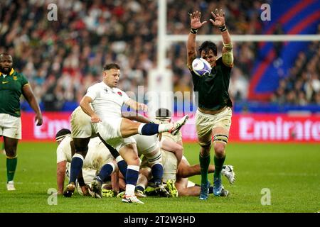 England's Danny Care kicks away from South Africa's Franco Mostert during the Rugby World Cup, semi final match at the Stade de France, Saint-Denis. Picture date: Friday October 21, 2023. Stock Photo