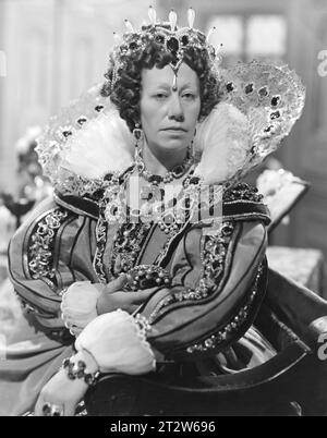 FLORA ROBSON as QUEEN ELIZABETH the First in FIRE OVER ENGLAND 1937 Directed by WILLIAM K. HOWARD Novel A. E. W. MASON Portrait by TUNBRIDGE Costume Design RENE HUBERT  Music RICHARD ADDINSELL  Producer ERICH POMMER Pendennis / United Artists Stock Photo