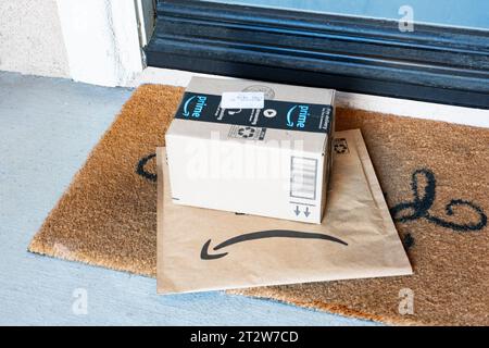 Lake Elsinore, CA, USA - October 21, 2023: Amazon Prime boxes delivered to the front door of home. Stock Photo