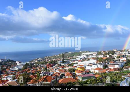 Rainbow over the city of Funchal on Madeira Island, Portugal Stock Photo