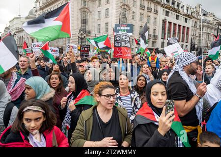 Protestors Against The Bombing Of Gaza With Palestinian Flags And ...