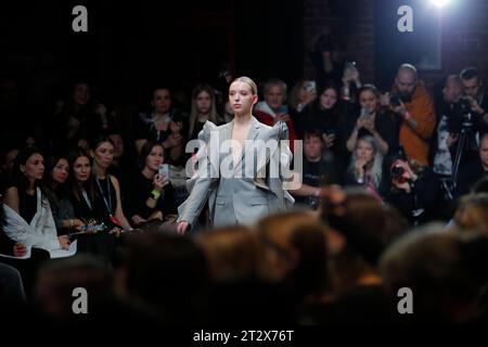 Moscow, Russia. 21st Oct, 2023. Models present creations by a Russian ...